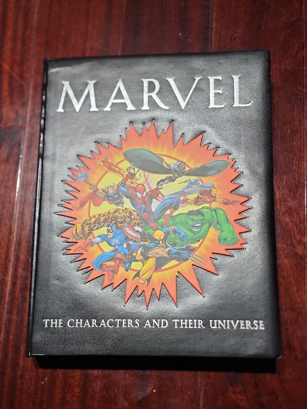 Marvel: The Characters and Their Universe by Mallory